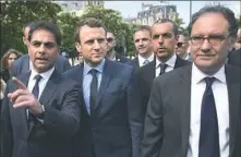  ?? Lionel Bonaventur­e/AFP/Getty Images ?? French presidenti­al election candidate for the En Marche! movement, Emmanuel Macron, second from left, along with Mourad Franck Papazian, co-president of France's Armenian Organizati­ons Coordinati­on Council; and CCAF co-president Ara Toranian, arrive...