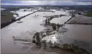  ??  ?? Flooded fields near Marden, Herefordsh­ire