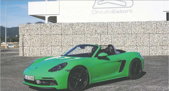  ?? PHOTOS: BRIAN HARPER/DRIVING ?? The 2021 Porsche 718 Boxster GTS 4.0, shown, and its sister car the Cayman GTS 4.0 both benefit from the return of the six-cylinder boxer engine.