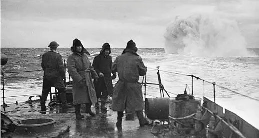  ??  ?? A British destroyer drops a depth charge. The Royal Navy would play a critical role in Britain’s wartime survival – particular­ly in seeing off the U-boat menace during the Battle of the Atlantic. But was the RAF the key to securing ultimate victory?