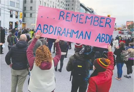  ?? JEAN LEVAC ?? Supporters of Abdirahman Abdi, who died at the hands of police, took to the streets and blocked Elgin Street at Laurier Avenue on Tuesday.