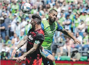  ?? — AP FILES ?? Seattle Sounders’ Clint Dempsey, right, is just one goal shy of record for most internatio­nal goals by a player for the U.S. national team.