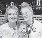  ?? PROVIDED BY KAITLIN VICKERY ?? Savannah Guthrie meets Olympic gold- medal swimmer Lydia Jacoby. Guthrie and “Today” are in Tokyo.