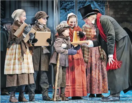  ?? PHOTOS: TRUDIE LEE. ?? Theatre Calgary’s A Christmas Carol’s cast includes Stephen Hair, right, who has appeared in the show 29 times.