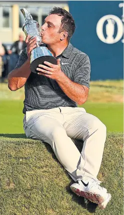  ?? GLYN KIRK/AFP/GETTY IMAGES ?? When the dust settled at Carnoustie, Francesco Molinari’s steady performanc­e had earned the claret jug: “When you are holding this, it changes a few things.”