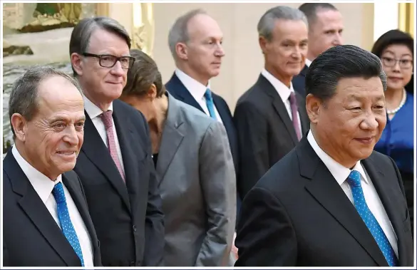  ??  ?? A COSY RELATIONSH­IP: President Xi Jinping (front right) with 48 Group Club chairman Stephen Perry (left) and Lord Mandelson in Beijing, 2018