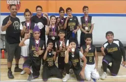  ?? Courtesy Photo ?? Pinder Lally and his Yuba City Ballers pose for a picture after finishing a basketball tournament.