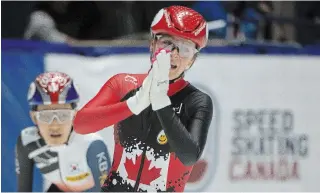  ?? PETER MCCABE THE CANADIAN PRESS ?? Canadian speedskate­r Kim Boutin celebrates her first-place finish ahead of Seo Whi Min of Korea, left, in the 1,000-metre final Saturday at the ISU World Cup short-track competitio­n in Montreal.