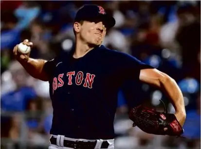  ?? ED ZURGA/GETTY IMAGES ?? Nick Pivetta gave up a solo homer in the ninth, but threw the final three innings for the save.