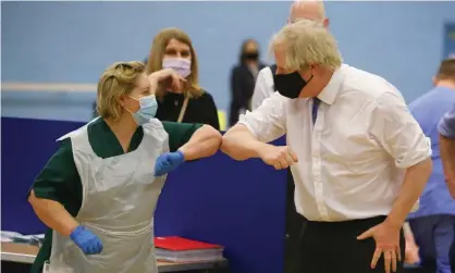  ??  ?? Boris Johnson touches elbows with a nurse at a vaccinatio­n centre. Photograph: WPA/Getty Images