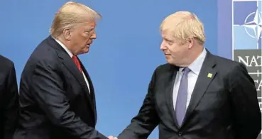  ?? /Steve Parsons/Getty Images ?? Serial liars : British Prime Minister Boris Johnson greets US President Donald Trump. Despite being repeatedly caught out for lying, the two were elevated to the highest political positions in their respective countries.