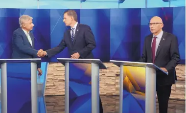  ?? GREG SORBER/JOURNAL ?? U.S. Senate candidates, from left, Libertaria­n Gary Johnson, Democrat Martin Heinrich and Republican Mick Rich on Friday night participat­ed in a debate broadcast on KOAT-TV.