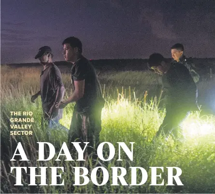  ?? PHOTOS BY JACK GRUBER/ USA TODAY ?? Border Patrol Agent Jesse Moreno, right, helps other agents detain three men suspected of crossing into the USA in the wetlands near Granjeno, Texas. This year, agents have encountere­d more than 359,000 migrants, an average of about 2,100 each day in the Rio Grande Valley.