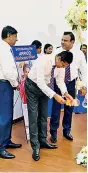  ??  ?? From left: Arpico Insurance PLC CEO Harsha De Alwis converses with General Manager Sales H.E.T. Sampath while GM Sales N.C.P. Nishan lights oil lamp at Diabcare launch