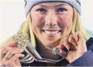  ?? Tom Pennington/Getty Images ?? Gold medalist Mikaela Shiffrin poses for a photo during the medal ceremony for Women’s Giant Slalom at the FIS Alpine World Ski Championsh­ips on Thursday in Meribel, France.