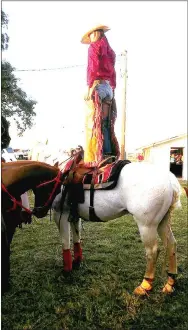  ?? COURTESY PHOTO ?? Mae Davis, 16, performs as Bullwhip Mae, sort of a modern day Annie Oakley, wild west cowgirl who uses a bullwhip instead of a gun while standing on her horse.