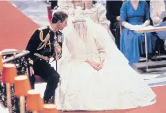  ??  ?? Prince Charles speaks with Princess Diana in 1981 during their wedding ceremony, in St Paul’s Cathedral, London.