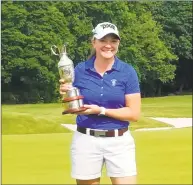  ?? Joe Morelli / Hearst Connecticu­t Media ?? Loretta Gionvannet­tone poses with the championsh­ip trophy after winning the 21st Connecticu­t Women’s Open at Brooklawn Country Club in Fairfield on Wednesday.