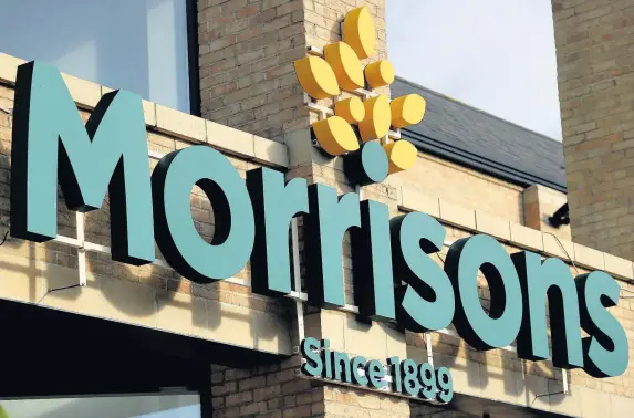  ?? Chris Radburn ?? > Morrisons said it enjoyed an ‘especially strong’ festive season as it posted a 2.1% hike in sales