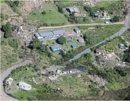  ?? /SANDILE NDLOVU ?? Floods in KZN closed many roads, cutting off some communitie­s from the outside world.