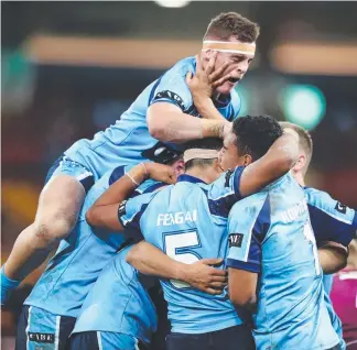  ?? Picture: BRETT COSTELLO ?? Blues under-16 players celebrate victory against Queensland.