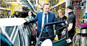  ??  ?? David Cameron campaigns with Labour’s Harriet Harman to remain in the EU at a car assembly plant in Cowley, near Oxford, yesterday. Right: Priti Patel, the employment minister, who backs Leave, with Cpl Donald Williams, and Lieut Francis Goode, members...