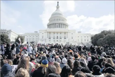  ?? PICTURE: EPA-EFE/AFRICAN NEWS AGENCY (ANA) ?? Youngsters rally for a national school walkout over gun violence in Washington DC this week. Pupils across the US walked out of their classes for 17 minutes to honour the 17 victims of the February 14 shooting at Marjory Stoneman Douglas High School in...