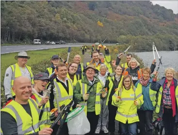  ??  ?? Friends of Loch Lomond and the Trossachs litter pickers work to keep the area tidy.