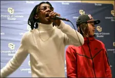  ?? CLIFF GRASSMICK/STAFF PHOTOGRAPH­ER ?? Vishnu Gonzales, left, and Al Hassan Muhammad of the Supreme Team sing rap songs during the grand opening of CU’S newest academic and research center, the Center for African and African American Studies, or CAAAS (also called “the Cause”), in historic Macky Auditorium.