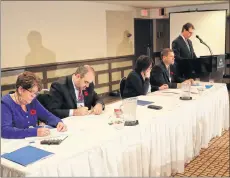  ?? STU NEATBY/THE GUARDIAN ?? PC Leader James Aylward, far right, addresses members during the party’s AGM on Saturday. Members of the party’s executive, from left, official agent Michelle Burge, treasurer Ryan Pineau, vice-president Suzi Deblois and president Charles Blue gave reports on election readiness, spending and activities over the 2017-18 year.