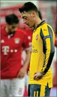  ??  ?? NO EXCUSES: Ozil was distraught after Arsenal’s 5-1 defeat in Munich