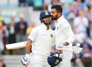  ?? AP ?? India’s K.L. Rahul (right) celebrates his century with India wicketkeep­er Rishabh Pant, who also scored his maiden ton, during the fifth day of the fifth and final Test at the Oval yesterday.