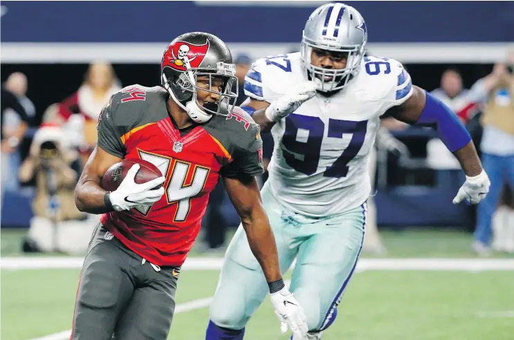  ?? — THE ASSOCIATED PRESS FILES ?? Despite a loss to the Dallas Cowboys on Sunday night, Charles Sims and the Tampa Bay Buccaneers are in the hunt for an NFC wild-card playoff berth.