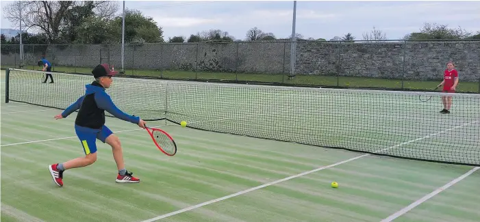  ??  ?? A match in progress at Sligo Tennis Club this week. Tennis and several other outdoor activities resumed on Monday.