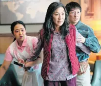  ?? ALLYSON RIGGS/A24 TNS ?? From left, Stephanie Hsu, Michelle Yeoh and Ke Huy Quan in ‘Everything Everywhere All At Once.’