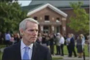  ?? BRYAN WOOLSTON — THE ASSOCIATED PRESS ?? Sen. Rob Portman, R-Ohio, speaks to the press before the funeral of Otto Warmbier, Thursday in Wyoming, Ohio.