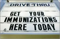  ?? ASSOCIATED PRESS ?? In this March 5, 2021, file photo a sign outside a pharmacy in Steelton, Pa., announces a drive-thru administer­ing COVID-19 vaccinatio­ns.