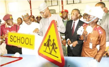  ?? Photo: FRSC ?? From left: Corps Marshal, Federal Road Safety Commission, Dr. Boboye Oyeyemi; FCT Minister, Malam Mohammed Bello; Secretary to the Government of the Federation, Boss Mustapha; and Head FRSC Signage Plant Gwagwalada, Mr. Emmanuel Dung, during the official inaugurati­on of the FRSC Signage Plant in Gwagwalada, Abuja yesterday.