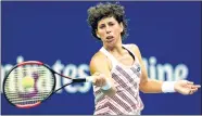  ??  ?? Carla Suarez Nevarro of Spain returns the ball to Russia’s Maria Sharapova during women’s singles fourth round match at the US Open