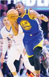  ?? — AP ?? Kevin Durant (right) of the Golden State Warriors and Oklahoma City Thunder’s Russell Westbrook during an NBA game in this file photo.