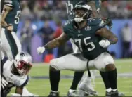  ?? MATT SLOCUM — THE ASSOCIATED PRESS ?? Former Eagles defensive lineman Vinny Curry reacts after tackling the Patriots’ Dion Lewis during Super Bowl 52 last season. Curry and Beau Allen, both members of that Super Bowl team, will line up with Tampa Bay on Sunday.