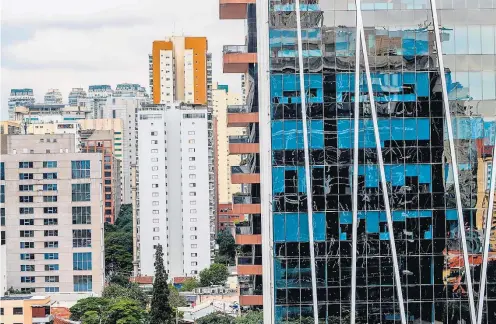  ?? GABRIELA BILÓ/ESTADÃO ?? Cabo de guerra. Número de distratos caiu, mas empresas ainda tentam regulação mais favorável no Congresso