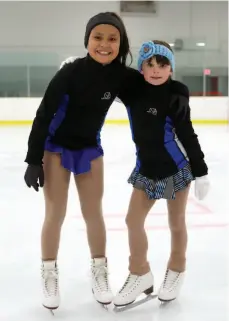  ?? CITIZEN PHOTO BY JAMES DOYLE ?? Nine-year-old Starlene Robinson, left, and eight-year-old Eowyn Thompson are part of a seven-skater delegation from the Prince George Figure Skating Club heading to Kamloops next weekend for the Autumn Leaves competitio­n.