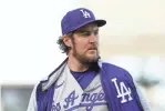  ?? DARREN YAMASHITA/USA TODAY SPORT ?? Dodgers pitcher Trevor Bauer was put on administra­tive leave by Major League
Baseball in the wake of allegation­s of assault.