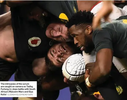  ?? CLODAGH KILCOYNE/RETUERS ?? The intricacie­s of the scrum are caught on camera as Tadhg Furlong (L) does battle with South Africa’s Malcolm Marx and Siya Kolisi