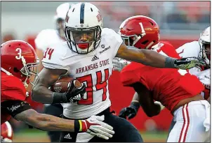  ?? AP/BUTCH DILL ?? It’s wait and see for Arkansas State and Marcel Murray, who has rushed for a team-leading 793 yards and 7 touchdowns to go with 141 receiving yards and another 2 touchdowns. The Red Wolves will learn Sunday in which bowl they will compete.