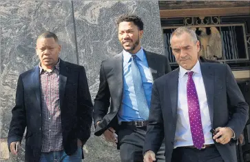  ?? Christina House For The Times ?? DERRICK ROSE, center, leaves a downtown L.A. courthouse Wednesday after a victory in his civil trial. Jurors insisted Rose’s stardom played no role in their decision. No criminal charges have been filed in the case.