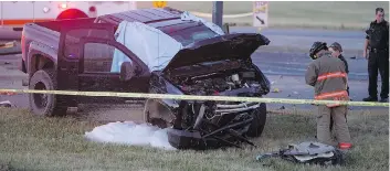  ?? LIAM RICHARDS ?? Emergency responders investigat­e at the corner of Airport Drive and Circle Drive on Monday after a police pursuit. The driver of the stolen truck died at the scene and has been identified as Austin Eaglechief.