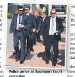  ??  ?? Police arrive at Southport Court yesterday.