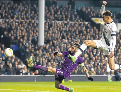  ?? Picture: Getty. ?? Fiorentina’s Gonzalo Rodriguez knocks the ball into his own net to seal Spurs’ victory.